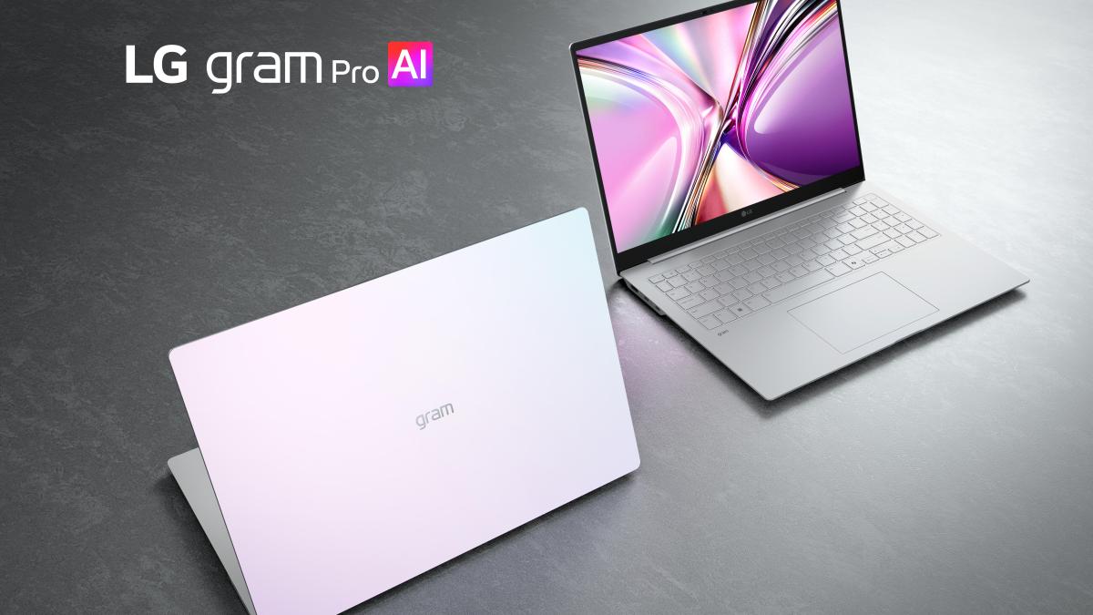 2026 Gram Pro Aerominum White model with back of the shell facing the camera. Another unit is facing screen-forward further in the background. They sit on a steel-grey flat surface. LG Gram Pro AI branding is in the top left.