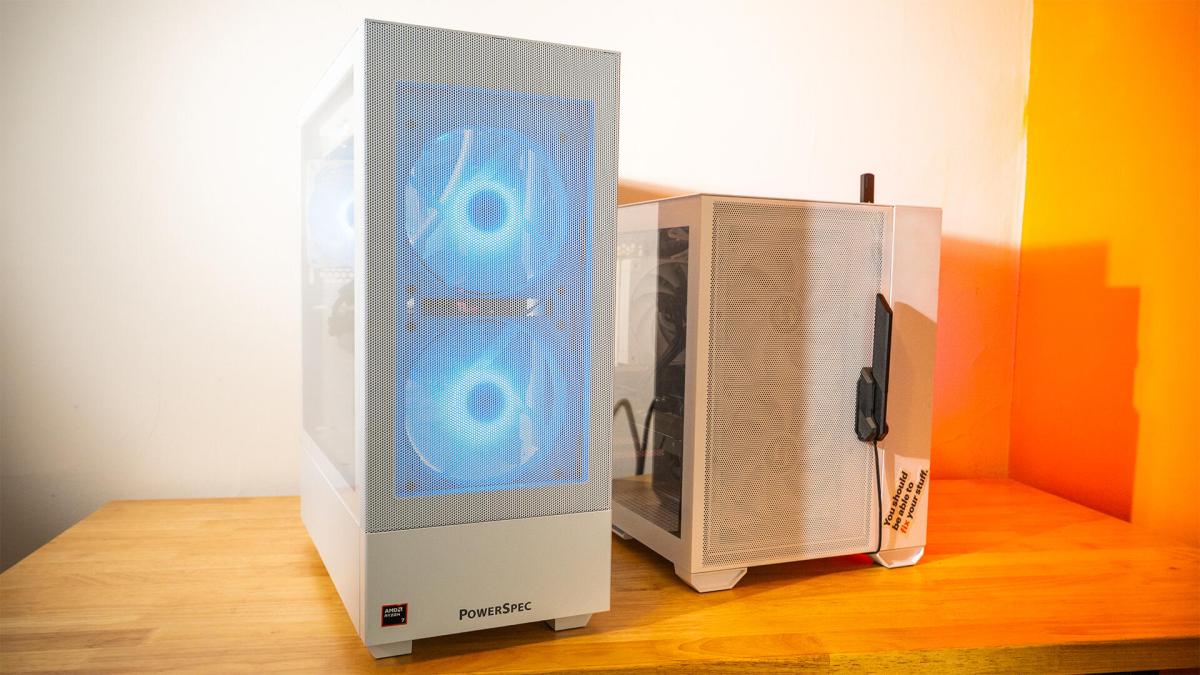 Two PCs side by side on a desk.