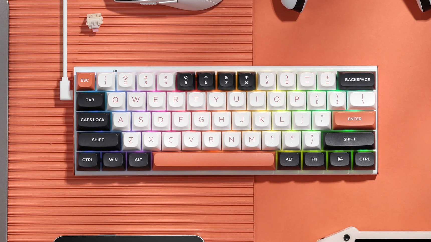 The Redragon FIDD K683 on an orange background.