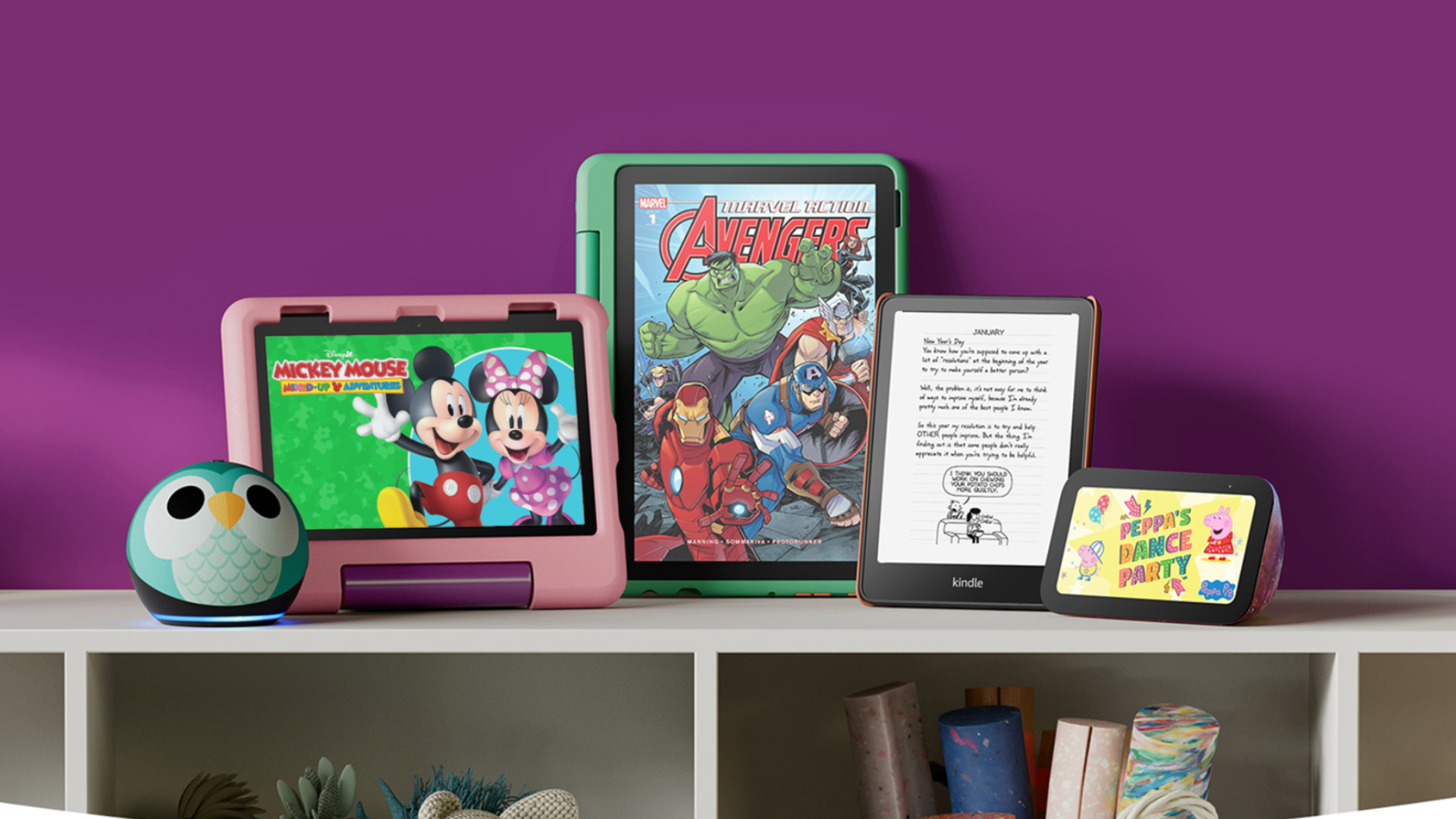 Amazon Kids' devices from left: Echo cote, pink tablet, green tablet, Kindle and Echo